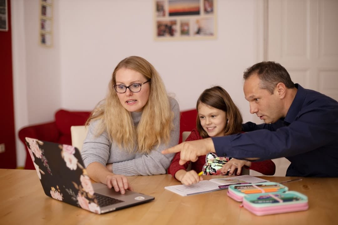 Parent and child learning together at home
