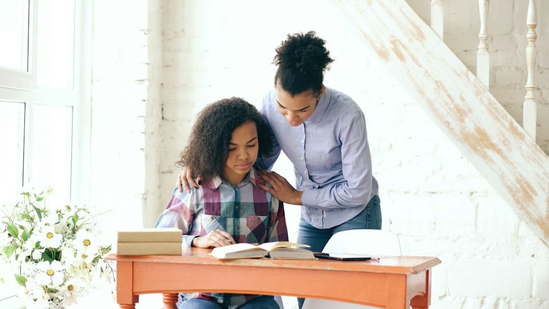 Student receiving help with home study