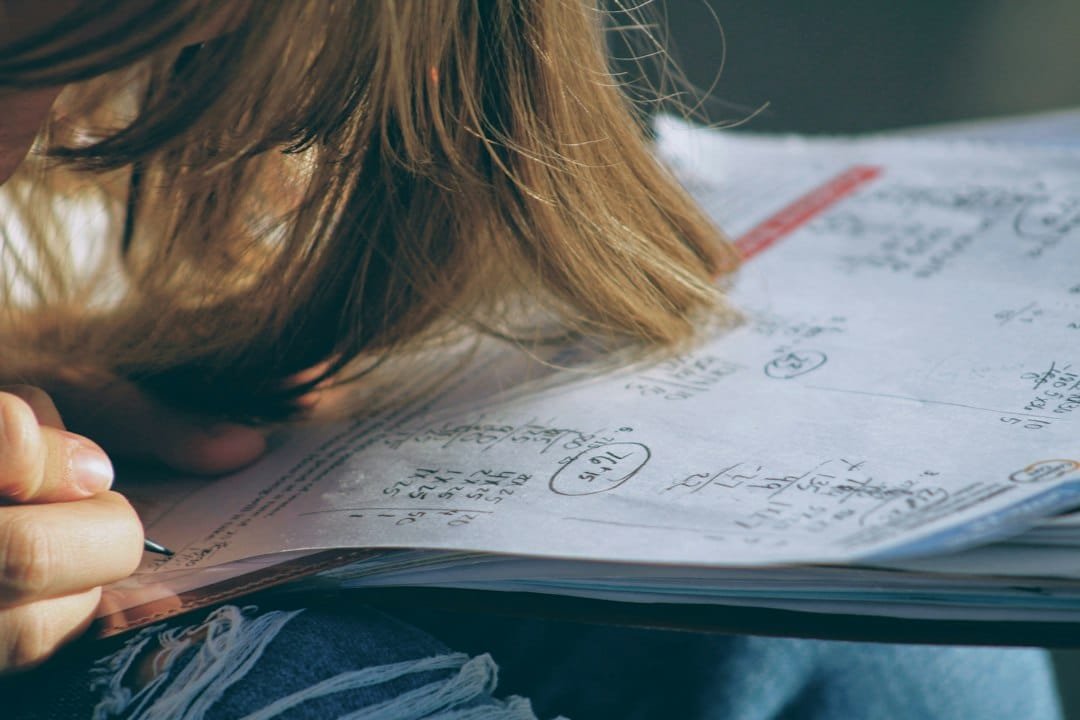 Student solving homework problems