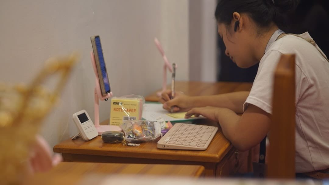 Student studying at a planned home tuition desk
